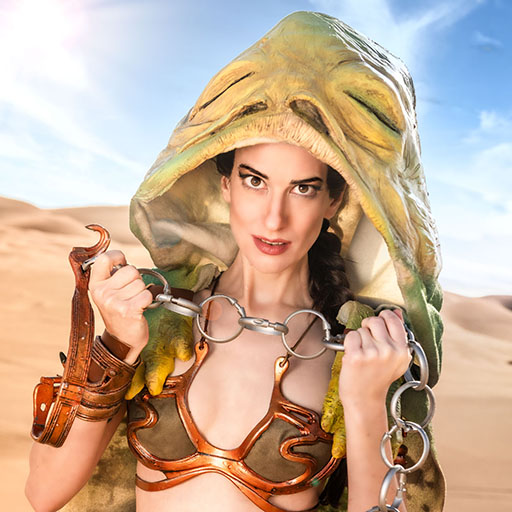 Amber cosplaying as Huttslayer Leia from Star Wars Return of the Jedi, wearing Leia's bikini and a cloak made from Jabba's pelt